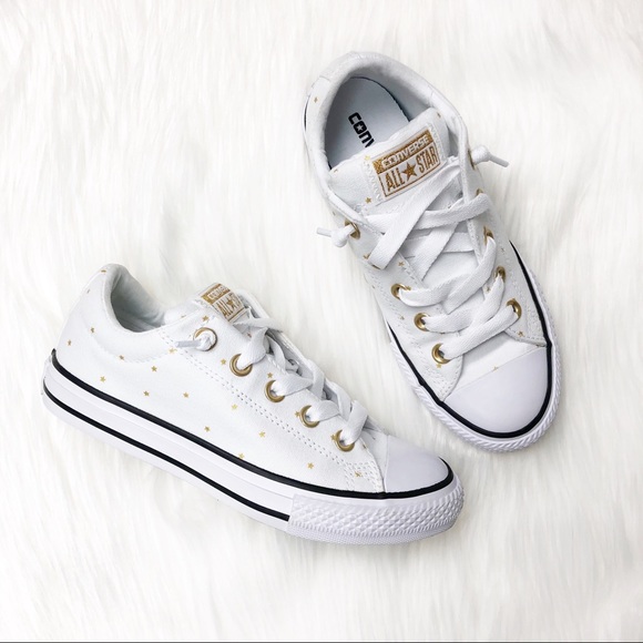 white converse with gold stars